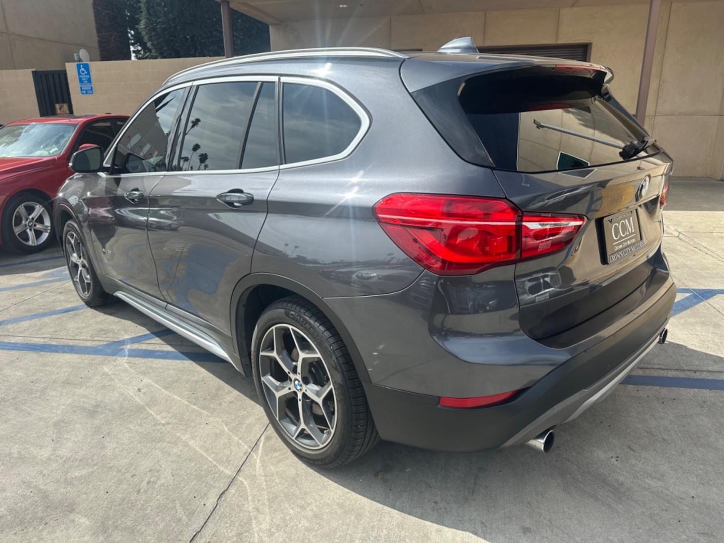 2016 Gray /Black BMW X1 leather (WBXHT3Z34G4) with an 4 CYLINDER engine, Automatic transmission, located at 30 S. Berkeley Avenue, Pasadena, CA, 91107, (626) 248-7567, 34.145447, -118.109398 - Crown City Motors is a used “Buy Here Pay Here” car dealer in Pasadena CA. “Buy Here Pay Here” financing, means that when you purchase your vehicle from our dealership, that you make the payments to the dealership as well. We do not need the banks approval to get you approved for a used auto - Photo#3